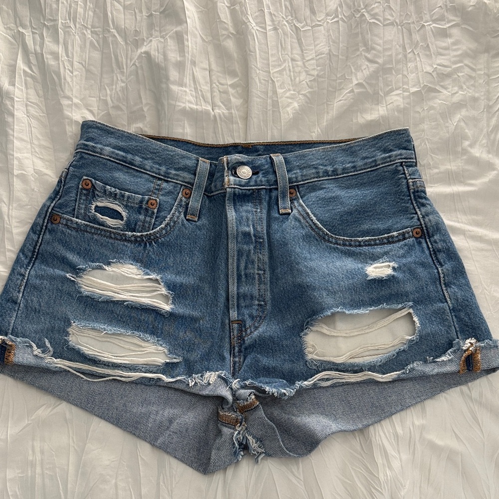 Levi’s 501 Blue Distressed Denim Shorts